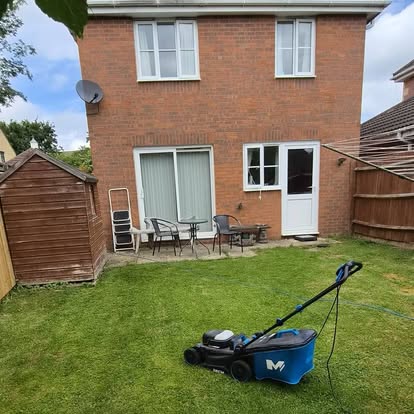 Lawn maintenance in a residential garden